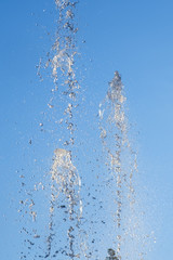 Water in park fountain. Hot summer. Happy holiday.