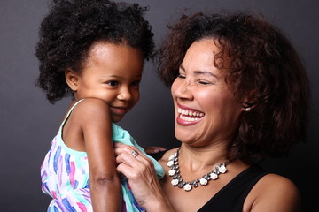 Mother with a daughter with afro hair