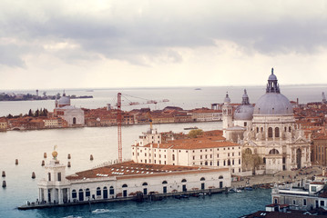 Venice roofs from above. Aerial view of houses, sea and palaces from San Marco tower