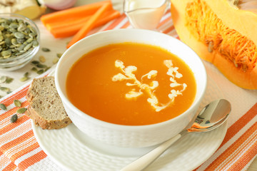 The tasty pumpkin soup puree and ingredients.
