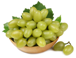 Green grapes on the plate isolated on white