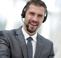 young agent of the call center with the headphones.