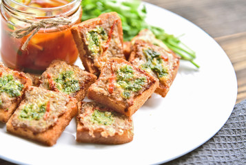 Fried toasts with Minced Pork Spread with chili sauce (Thai Pork Toast) . Toasts Menu for children.