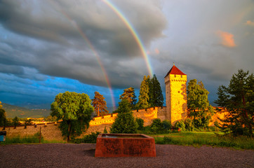 Old city wall and towers with rainbow in Luzern, Switzerland