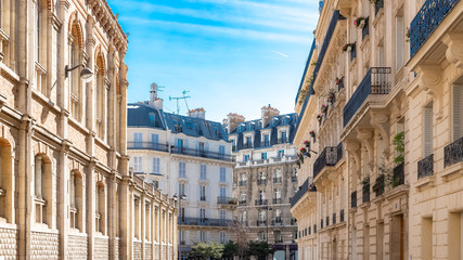 Paris, beautiful buildings boulevard des Batignolles, typical parisian facades  - obrazy, fototapety, plakaty