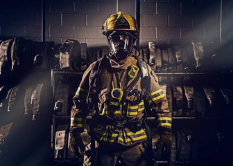 Firefighter wearinf protection clothes and gears
