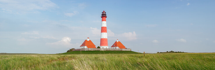 Fototapeta na wymiar Leuchtturm an der Nordseeküste, Banner-Panorama