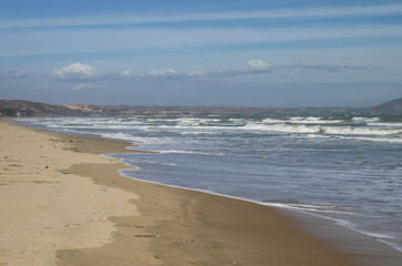 Windy day on sandy beach in Mui Ne, Vietnam