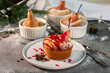 Pie with baked pear and fruit syrup.