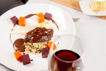Beef cheeks with vegetables, roasted parsley root mousse , pearl barley, dark chocolate and demi glace sauce