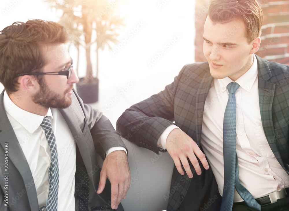 Wall mural business partners talking at the office