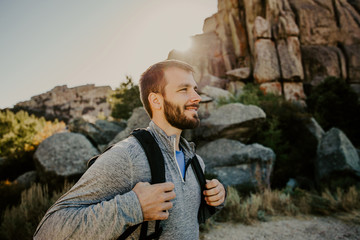 Man hiking  in rocky mountains