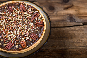 Pecan Pie, made from butter enriched pastry with golden syrup, maple sauce and breadcrumbs