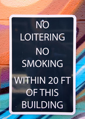 No smoking or loitering sign
