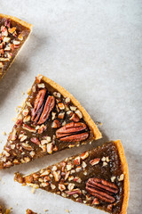 Pecan Pie, made from butter enriched pastry with golden syrup, maple sauce and breadcrumbs