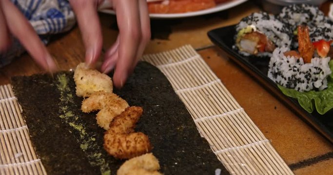 Side view of making sushi