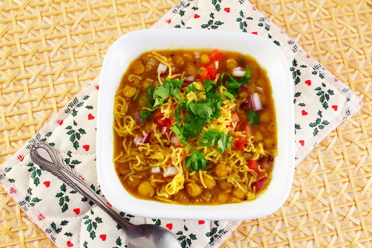 traditional indian gujarati food bhel snack or chaat sev usal or misal made from dried green peas besan vermicelli and spices