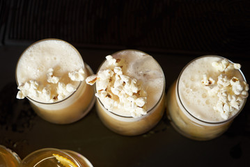 Professional Bartender is making fresh cocktail at bar counter, close-up