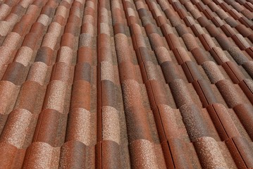 brown long tile texture on the roof of the building