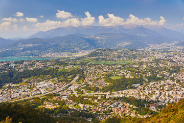 Fototapeta na wymiar View to Lugano from San Salvatore mountain in Lugano, Switzerland