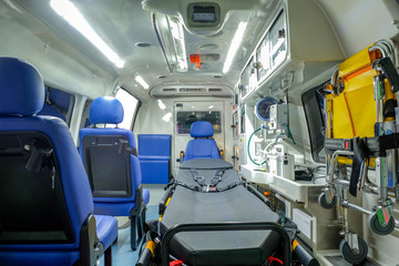 Inside an ambulance car with medical equipment for assistance patients before delivery to the hospital. © CHIRADECH