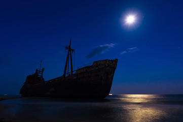 Greek coastline with the famous rusty shipwreck in Glyfada beach near Gytheio, Gythio Laconia...
