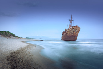 Greek coastline with the famous rusty shipwreck in Glyfada beach near Gytheio, Gythio Laconia...