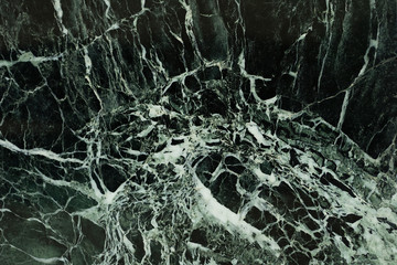 The dark green marble. Facing stone. Texture