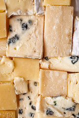 mosaic from cheese as background