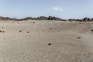 Teide national park area with rocky areas and sand on a sunny day, Tenerife island