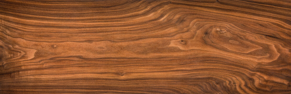 Super long walnut planks texture background.Walnut wood texture.Texture element	
