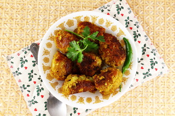 traditional indian gujarati food shallow fried roasted dudhi na muthia snack made from indian bottle gourd and spice