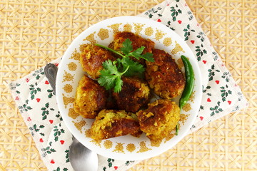 traditional indian gujarati food shallow fried roasted dudhi na muthia snack made from indian bottle gourd and spice