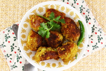 traditional indian gujarati food shallow fried roasted dudhi na muthia snack made from indian bottle gourd and spice