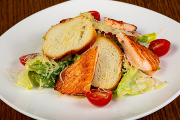 Caesar salad with salmon