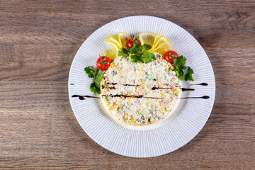 Salad with crab surimi
