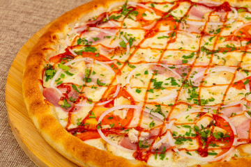 Pizza with ham and chicken