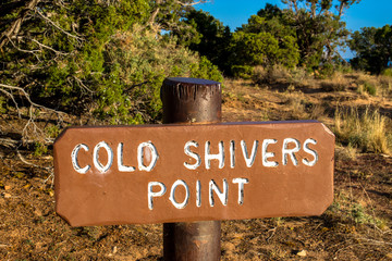 Sign along Rim Rock Drive marking the pullout for 