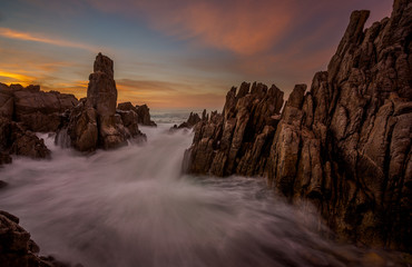 long exposure seascape with rocks