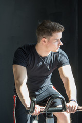 Obraz premium portrait of young man working out in a gym