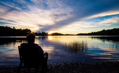 Fototapeta premium man watching the sunset