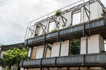 house under construction without roof and windows