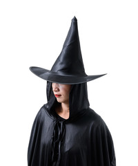 Portrait of woman in black Scary witch halloween costume standing with hat isolated on white background