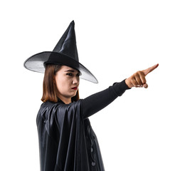 Fototapeta premium Portrait of woman in black Scary witch halloween costume standing with hat and Finger pointing at side view isolated on white background