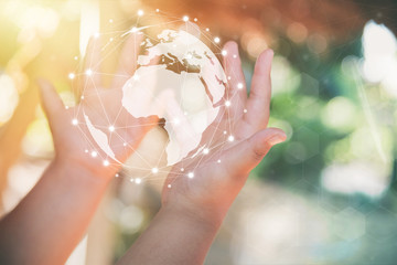 hand holding flying earth network global connection concept