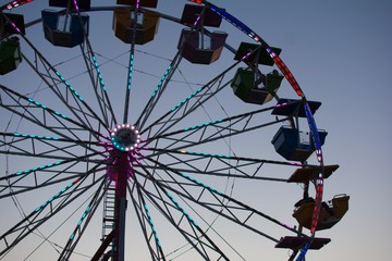 Small town carnival ferris wheel at dusk
