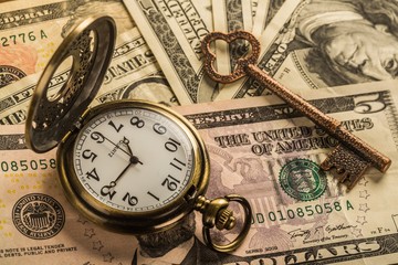Pocket Watch and Key on Banknotes