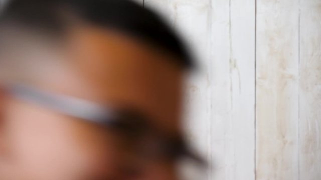 Queer gay black person with pride flag