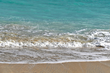 Bahamas beach with turquoise ocean water color and sandy beach