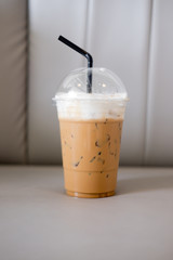 A cup of iced cappuccino coffee